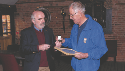 MOF Club Director George Wilder (left) present Bernard with his Marque of Friendship award.